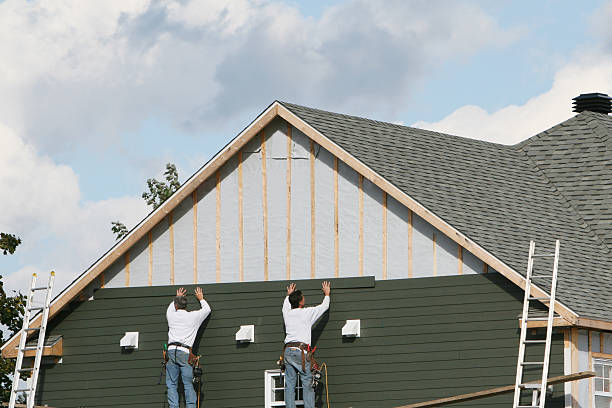 Professional Vinyl Siding technician working in Salem, MA